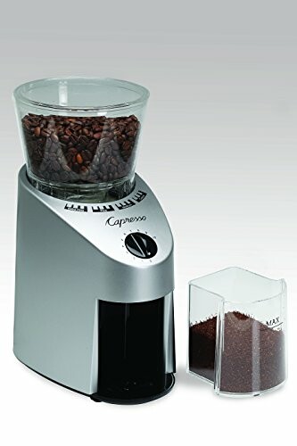 Capresso coffee grinder with coffee beans and grounds