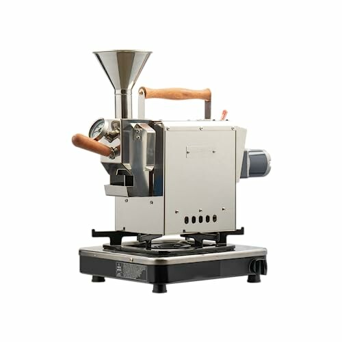 Compact coffee roaster machine with wooden handles.